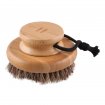 Bamboo body brush with natural bristles for skin care.