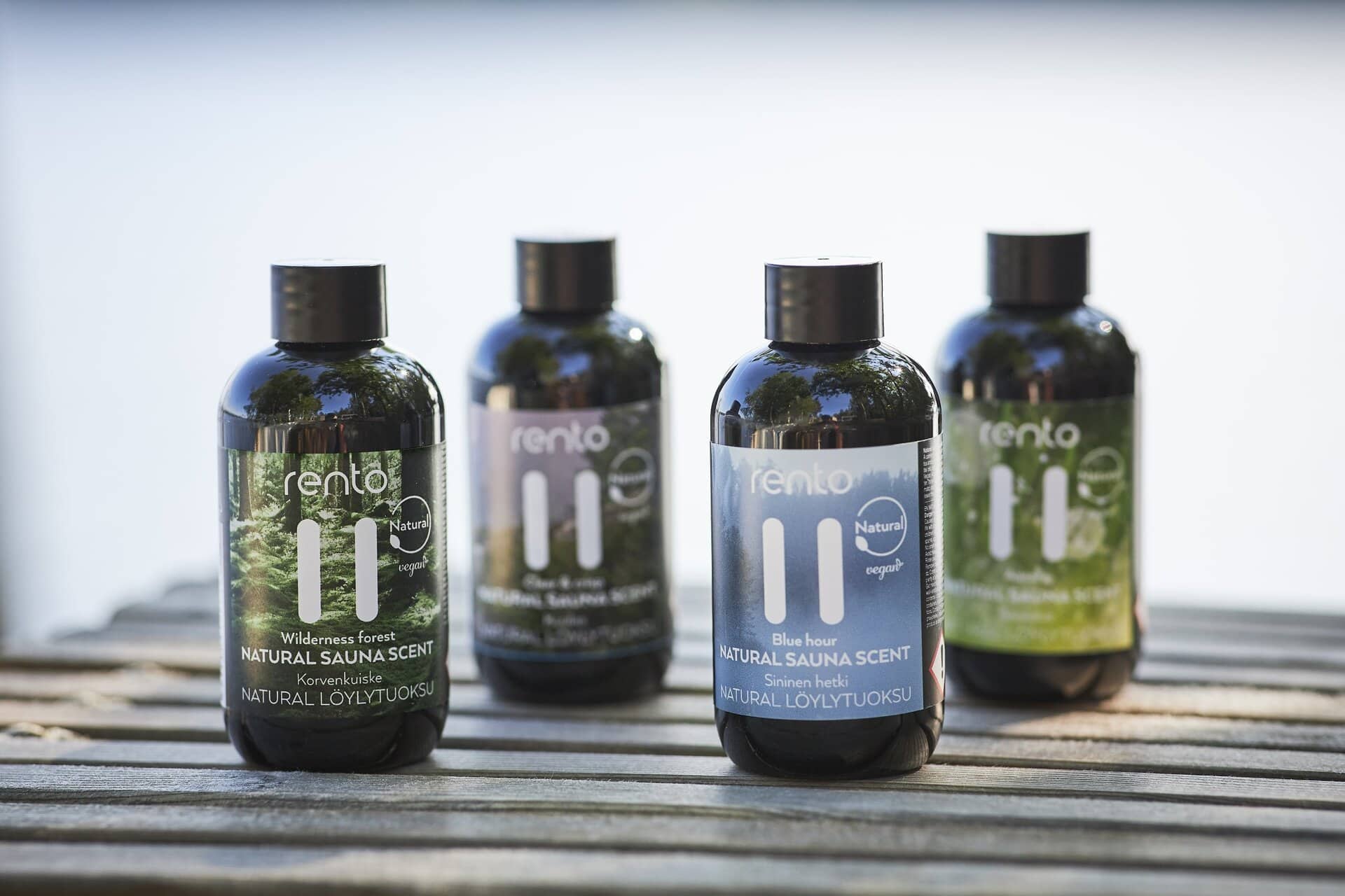 Rento Blue Hour sauna fragrance in a black bottle, ideal for a natural sauna experience.