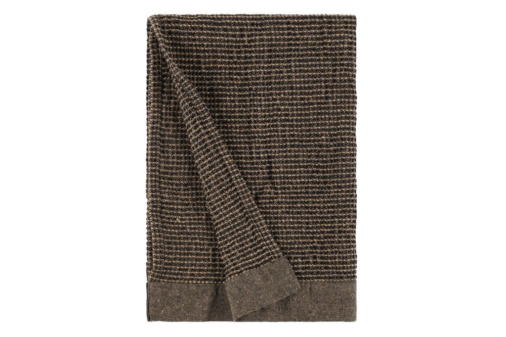 Black Kenno sauna towel measuring 50x70 cm, soft and absorbent. Perfect for use in the sauna or spa.