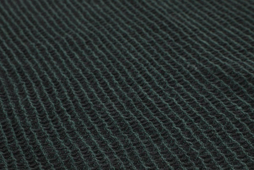 Dark green sauna towel 50x70 cm from Rento Kenno, ideal for relaxation and comfort.