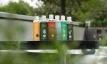 Natural pool chemicals and care products on a table.