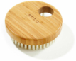Round bamboo body brush with natural bristles for skin care.