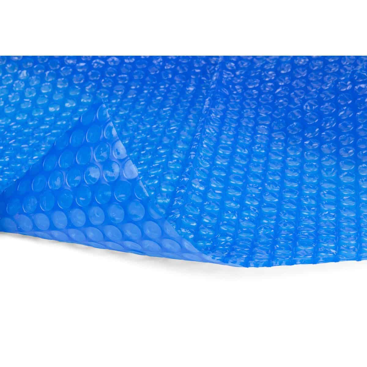 Blue air mattress with bubbles for pool, comfortable and durable.
