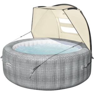 Swim spa with canopy for relaxation and comfort.